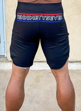 Load image into Gallery viewer, &quot;Fiscal&quot; competition board shorts
