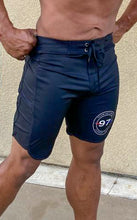 Load image into Gallery viewer, &quot;Fiscal&quot; competition board shorts
